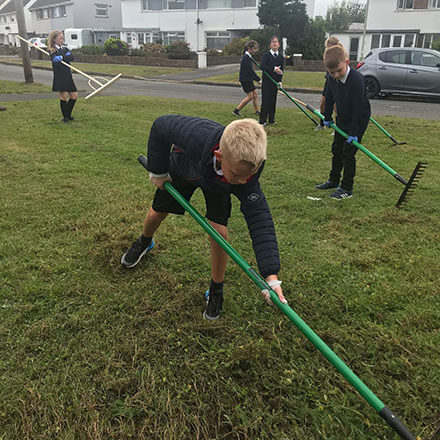 Raking event at Porthcawl Housing Estate